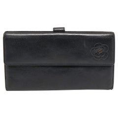 Chanel Black Camellia Embossed Leather Flap Wallet