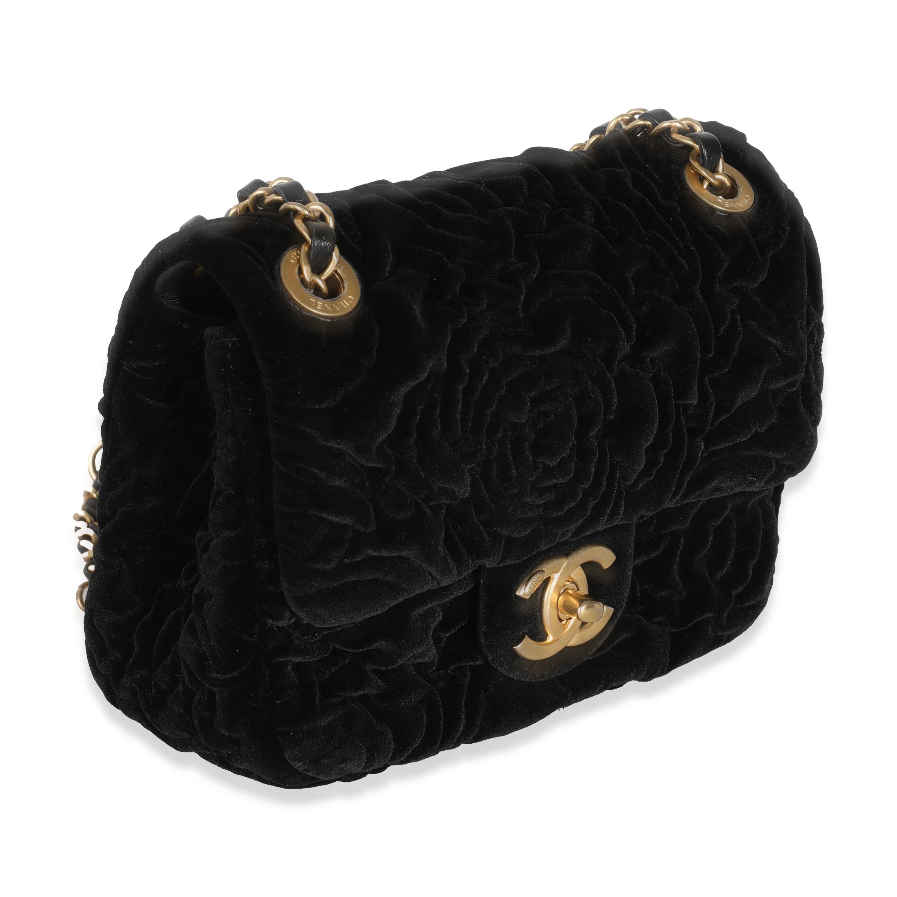 Listing Title: Chanel Black Camellia Embossed Velvet Mini Rectangular Flap Bag
SKU: 143525
Condition: Pre-owned 
Condition Description: A timeless classic that never goes out of style, the flap bag from Chanel dates back to 1955 and has seen a