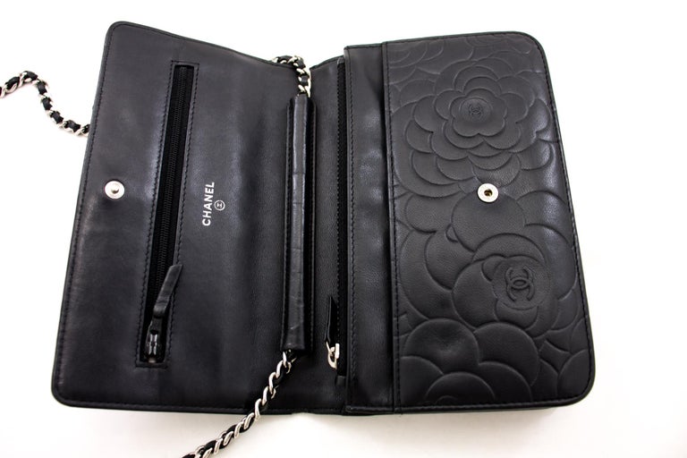 CHANEL Black Camellia Embossed WOC Wallet On Chain Shoulder Bag at 1stDibs