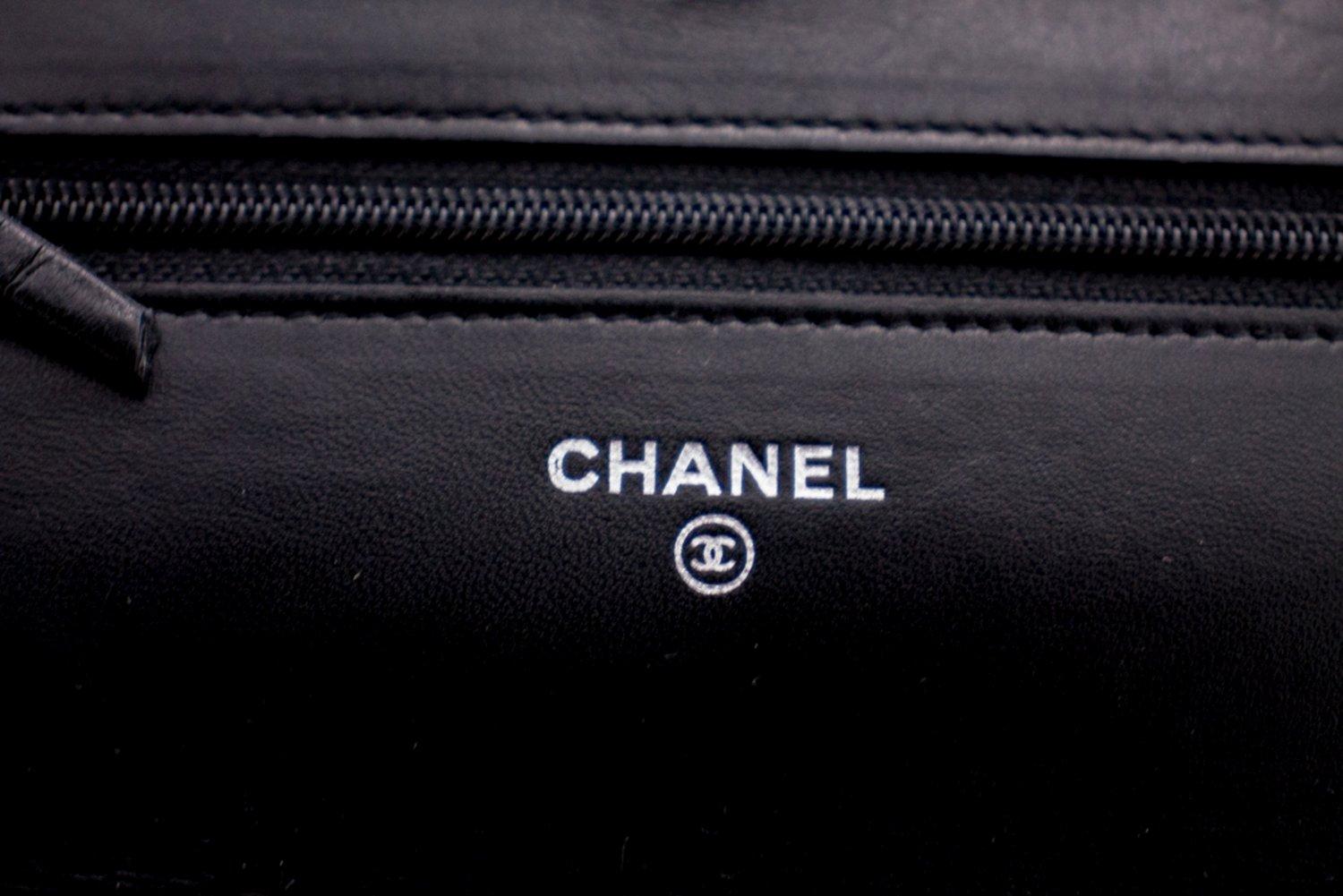 CHANEL Black Camellia Embossed WOC Wallet On Chain Shoulder Bag 8