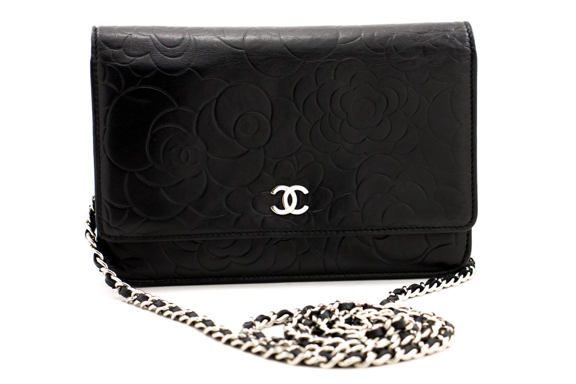 An authentic CHANEL Black Camellia Embossed Wallet On Chain WOC Shoulder Bag. The color is Black. The outside material is Leather. The pattern is Embossed. This item is Contemporary. The year of manufacture would be 2009.
Conditions &