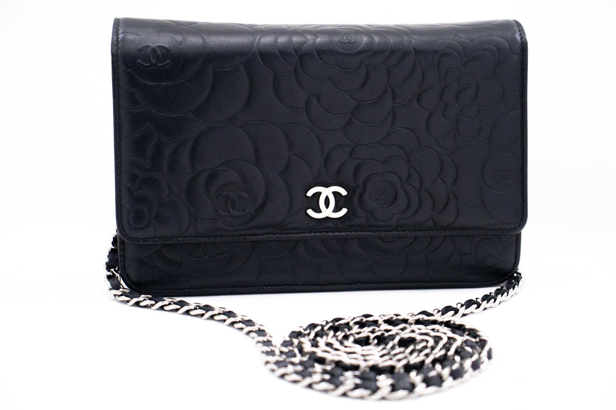 An authentic CHANEL Black Camellia Embossed Wallet On Chain WOC Shoulder Bag. The color is Black. The outside material is Leather. The pattern is Embossed. This item is Contemporary. The year of manufacture would be 2012.
Conditions &