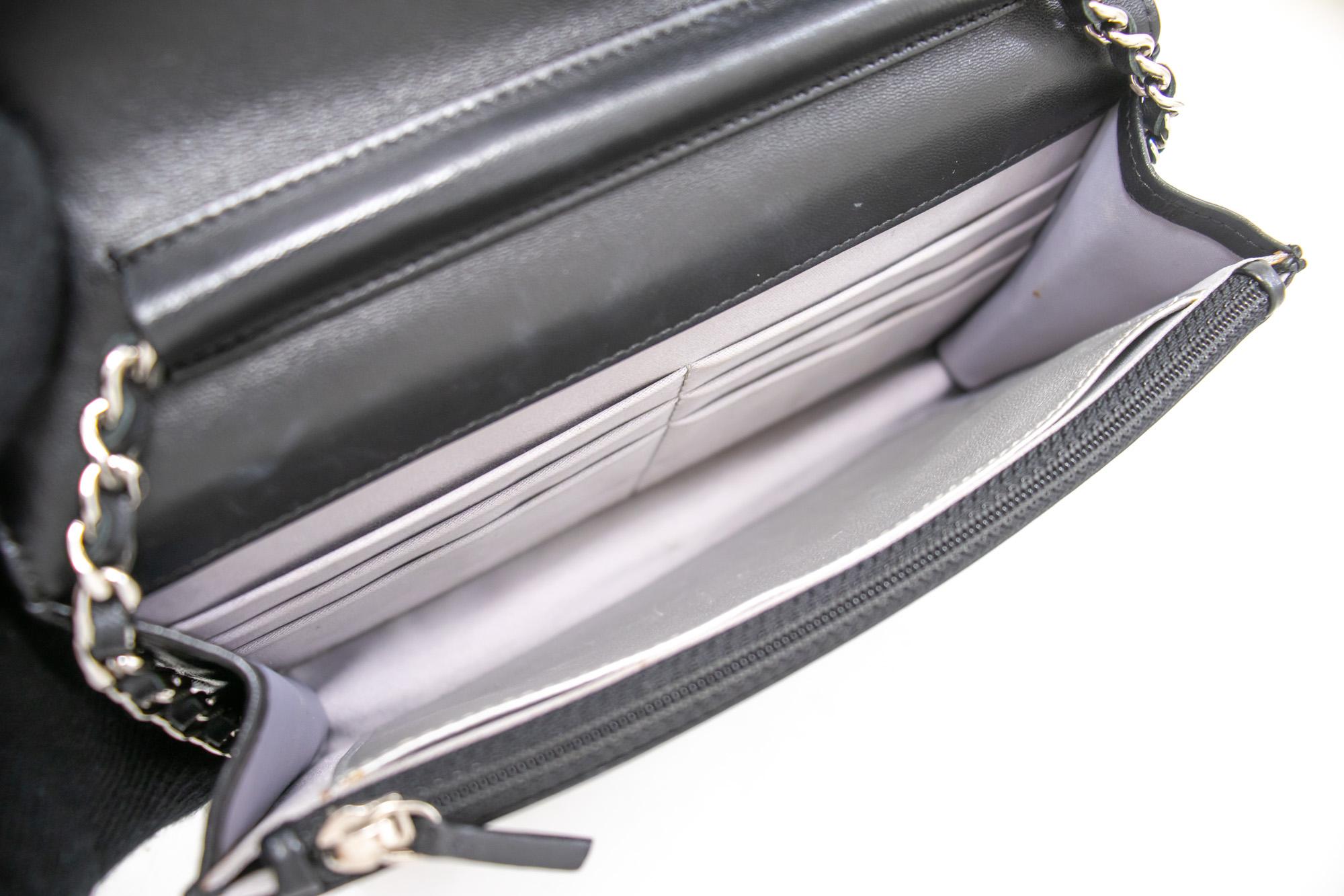 CHANEL Black Camellia Embossed WOC Wallet On Chain Shoulder Bag 5
