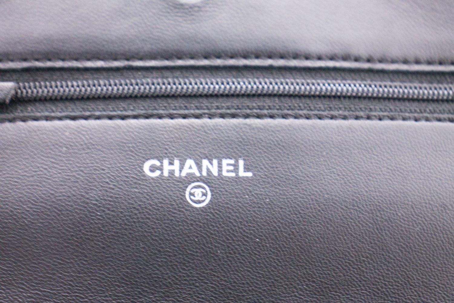 CHANEL Black Camellia Embossed WOC Wallet On Chain Shoulder Bag SV 10