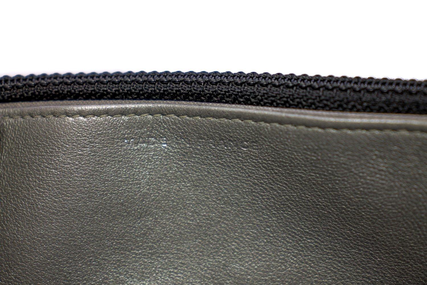CHANEL Black Camellia Embossed WOC Wallet On Chain Shoulder Bag SV 11