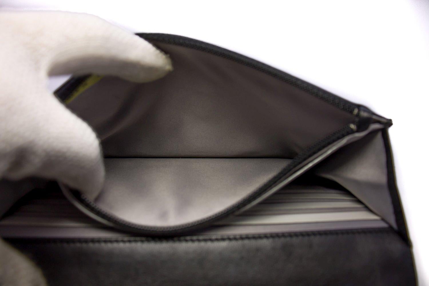 CHANEL Black Camellia Embossed WOC Wallet On Chain Shoulder Bag SV 12