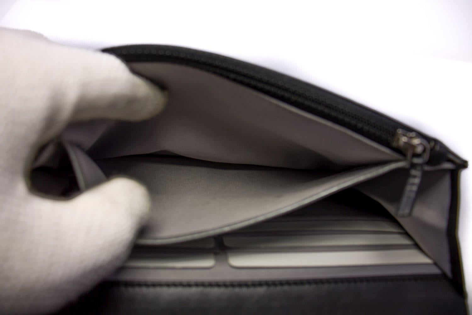 CHANEL Black Camellia Embossed WOC Wallet On Chain Shoulder Bag SV 13
