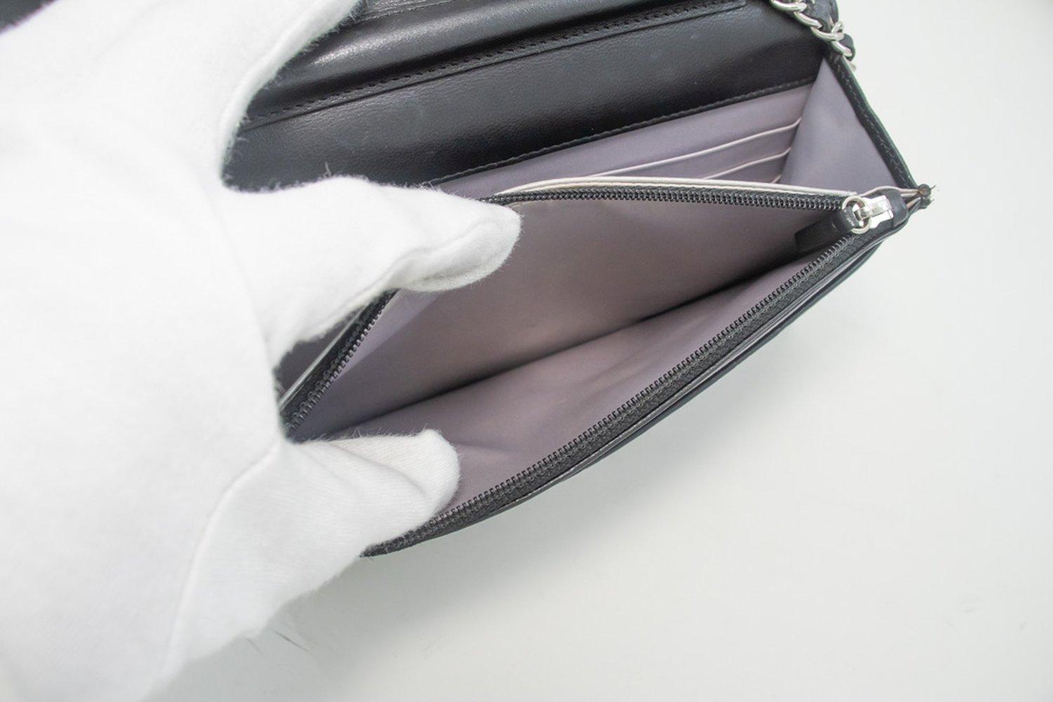 CHANEL Black Camellia Embossed WOC Wallet On Chain Shoulder Bag SV 14