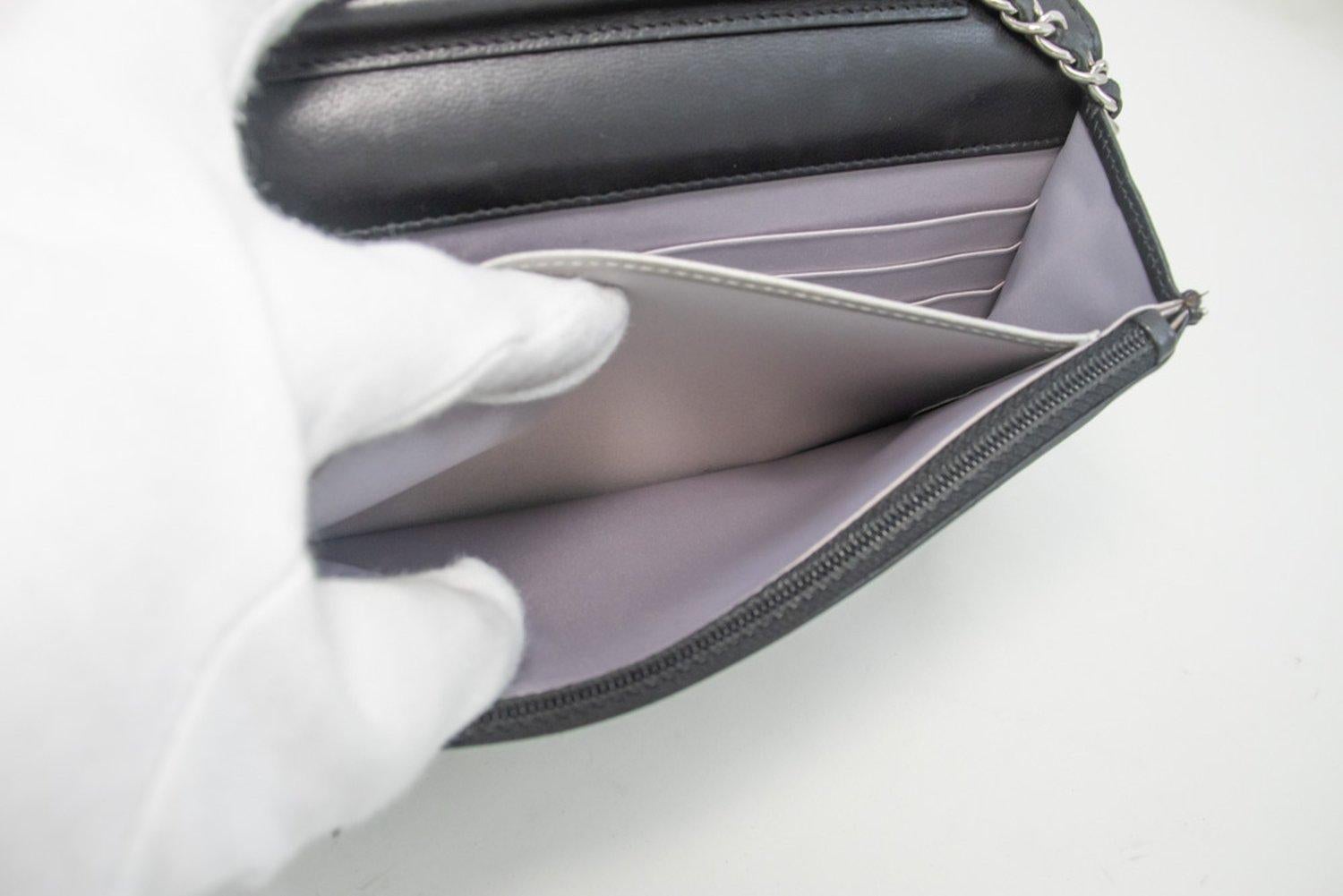 CHANEL Black Camellia Embossed WOC Wallet On Chain Shoulder Bag SV 15