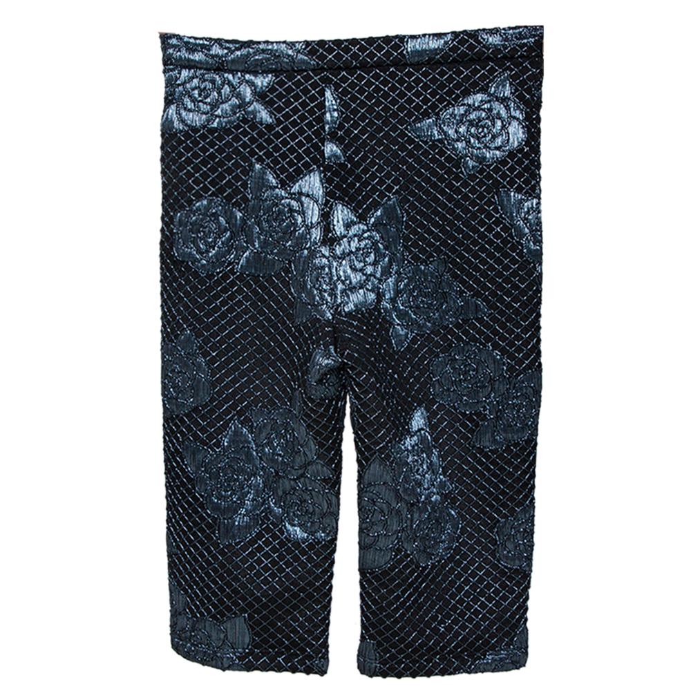 This pair of shorts is from Chanel's Resort 2017 collection. The creation is beautifully tailored and it has signature Camellia patterns detailed all over. The shorts offer a great fit and varied ideas on how to nail your casual