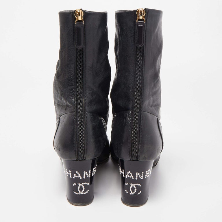 Chanel Black Canvas and Leather CC Cap Toe Ankle Boots For Sale at 1stDibs