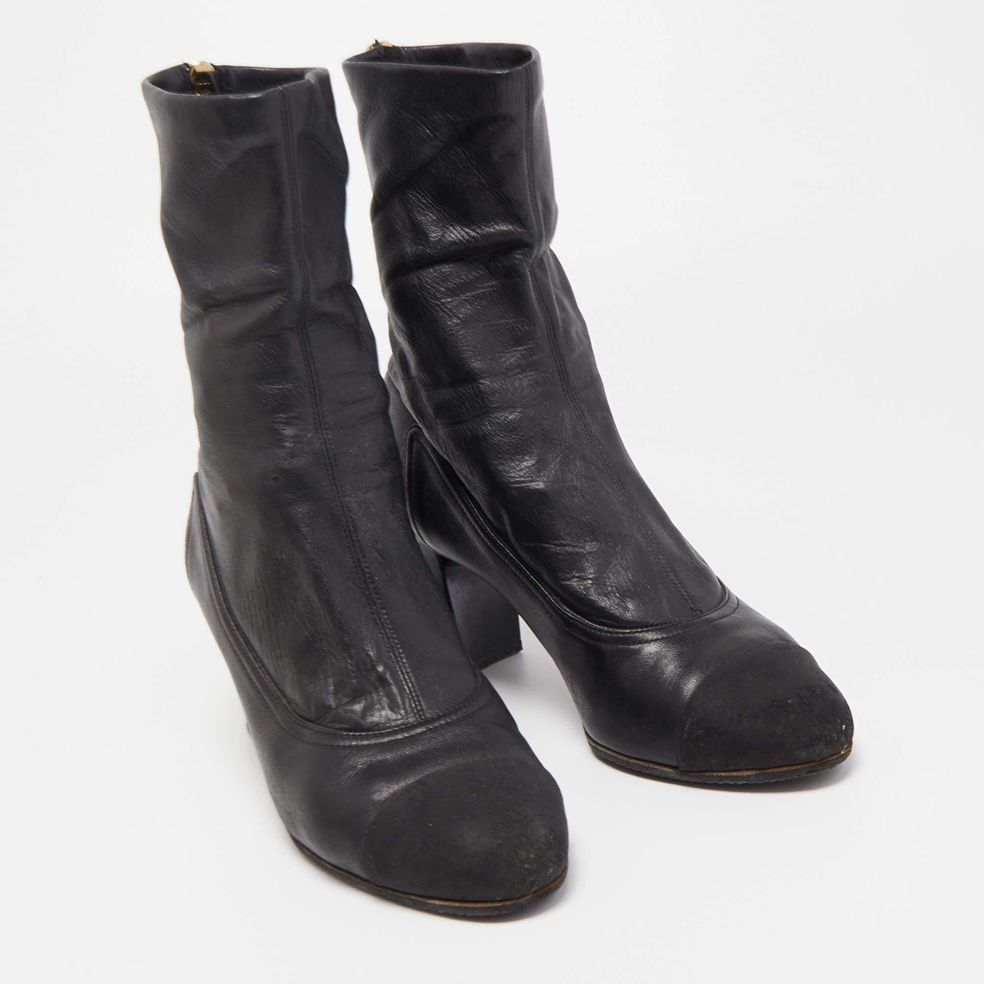 Chanel Black Canvas and Leather CC Cap Toe Ankle Boots  In Fair Condition For Sale In Dubai, Al Qouz 2