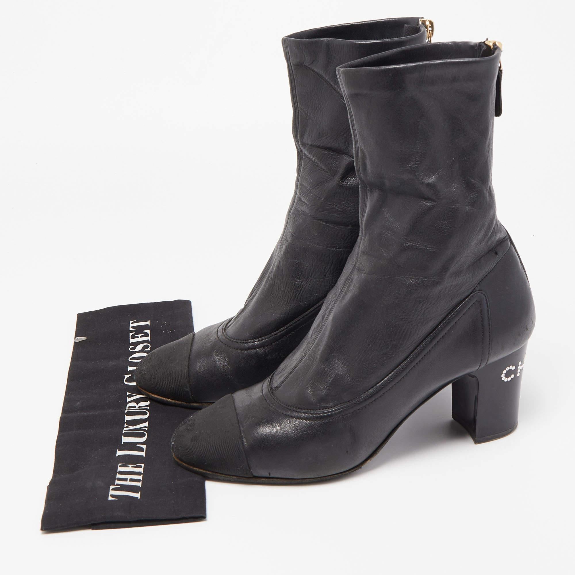 Chanel Black Canvas and Leather CC Cap Toe Ankle Boots  For Sale 4