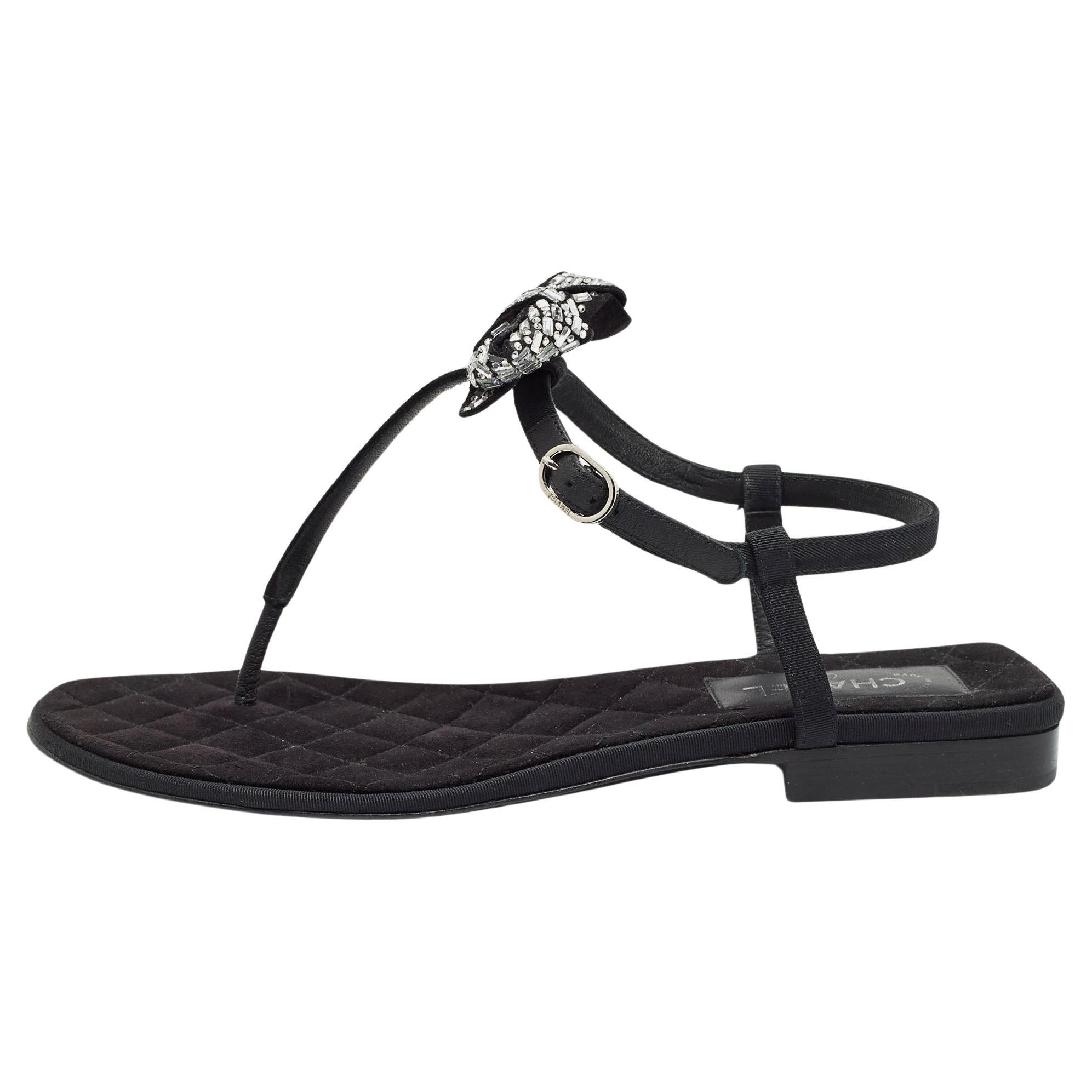 Chanel Schwarze flache Sandalen aus Segeltuch mit Schleife und Slingback aus Segeltuch Größe 38,5 im Angebot