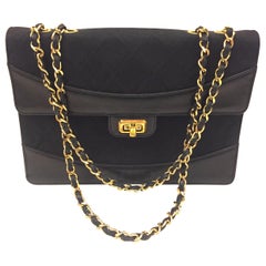 Chanel black canvas/leather shoulder bag 
