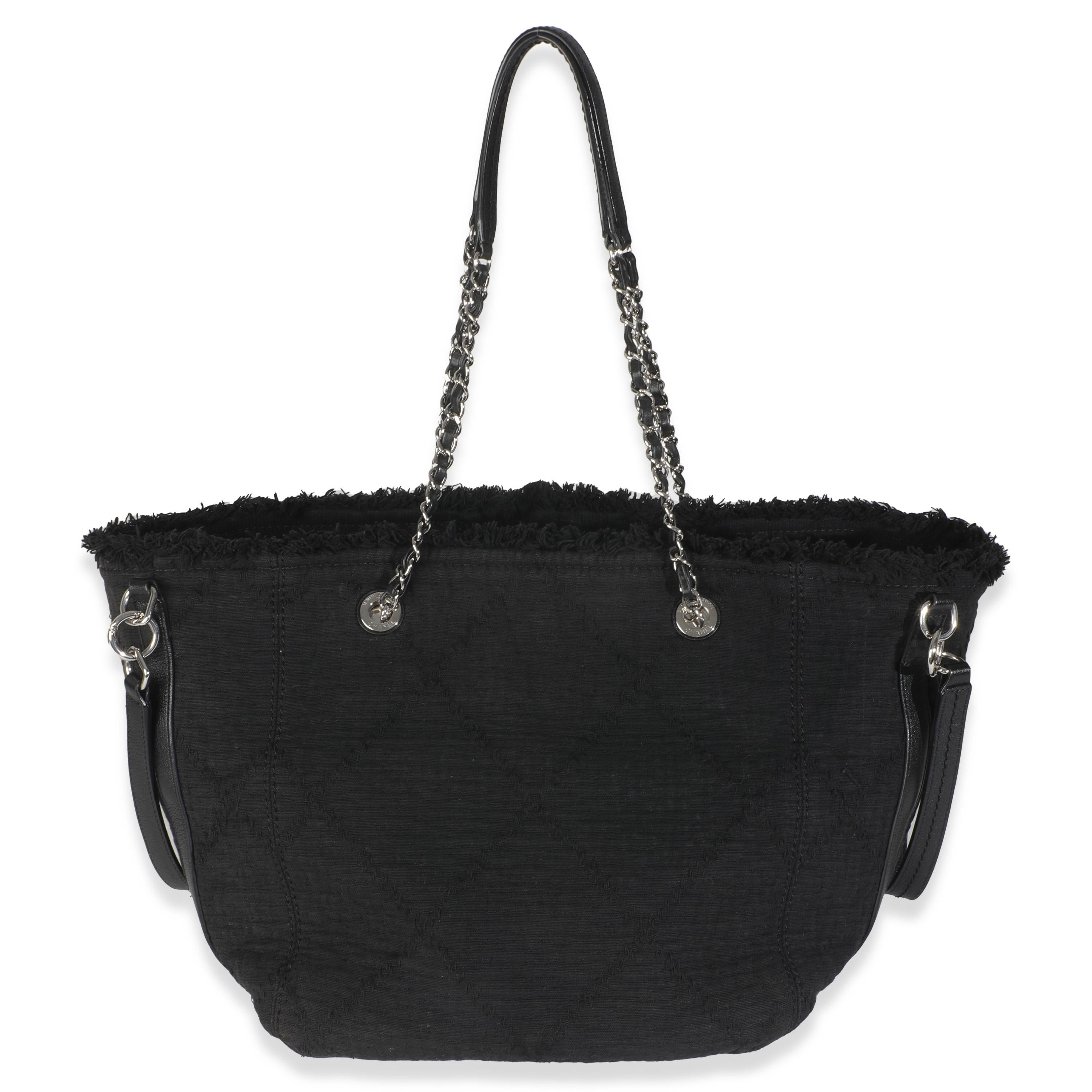 Listing Title: Chanel Black Canvas Small Double Face Deauville Tote
SKU: 145920
Condition: Pre-owned 
Handbag Condition: Good
Condition Comments: Item is in good condition with apparent signs of wear. Scratching along hardware. Fraying along