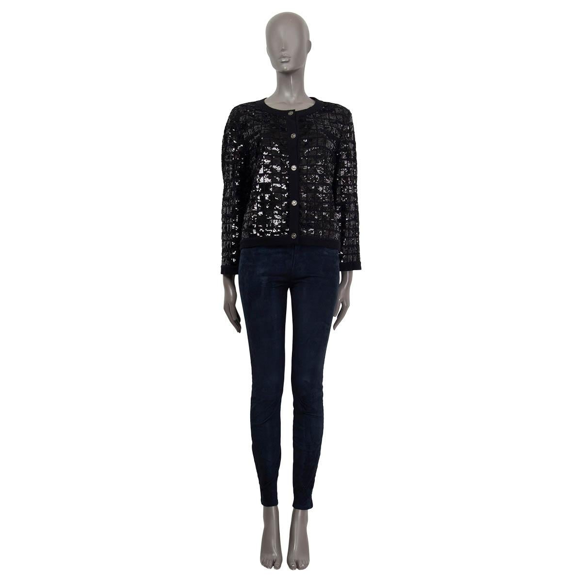 100% authentic Chanel Spring 2008 sequin embellished cardigan in black cashmere (100%). Opens with five 'CC' buttons on the front. Unlined. Has been worn and is in excellent condition.

Measurements
Tag Size	Missing Tag (M)
Size	M
Shoulder