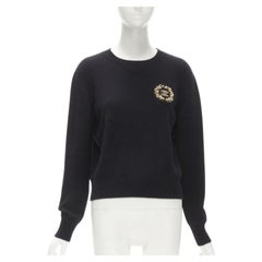 CHANEL Schwarzer Pullover aus Kaschmirmischung mit Goldperlen und CC-Verzierung FR42 L