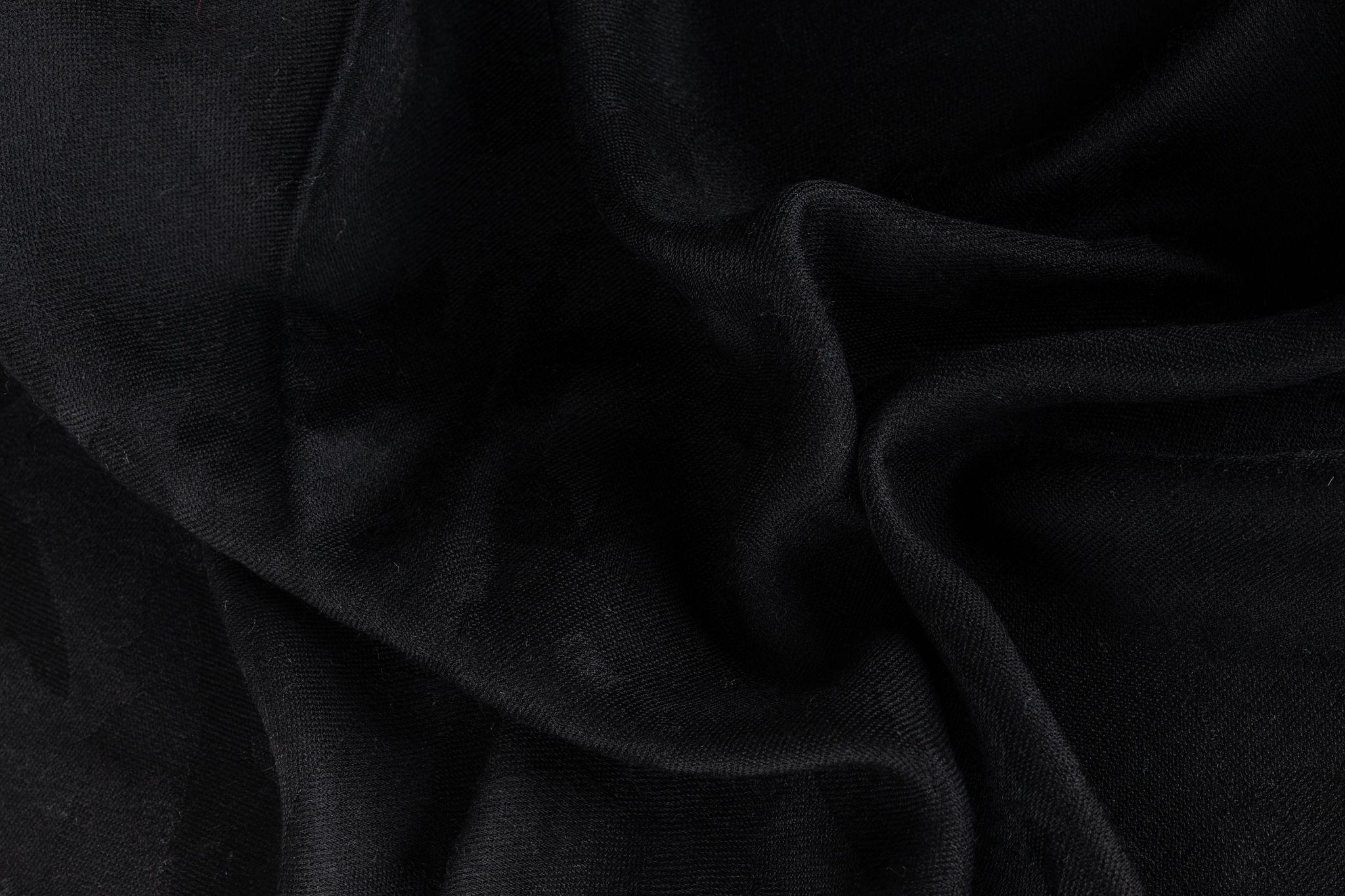 Chanel Black Cashmere Shawl in excellent condition. An absolute classic which can be worn in so many different ways.