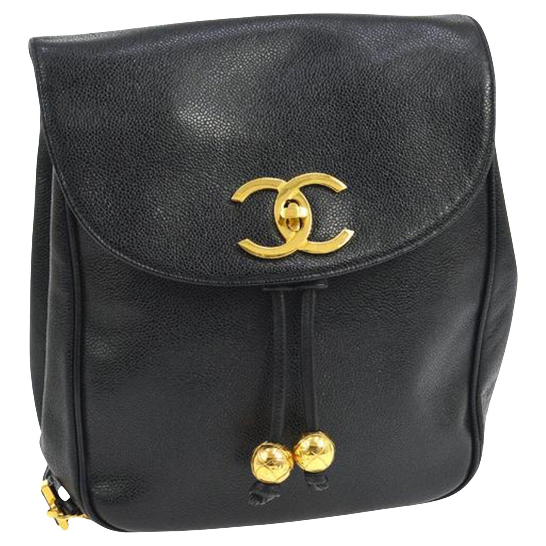Chanel Mochila Negra Caviar Vintage 2 Bolsillos Bola Encanto CC Logotipo