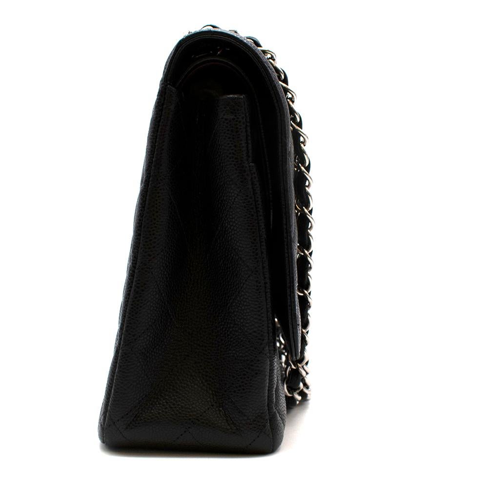 Chanel Black Caviar Calfskin Maxi Flap Bag In Excellent Condition For Sale In London, GB