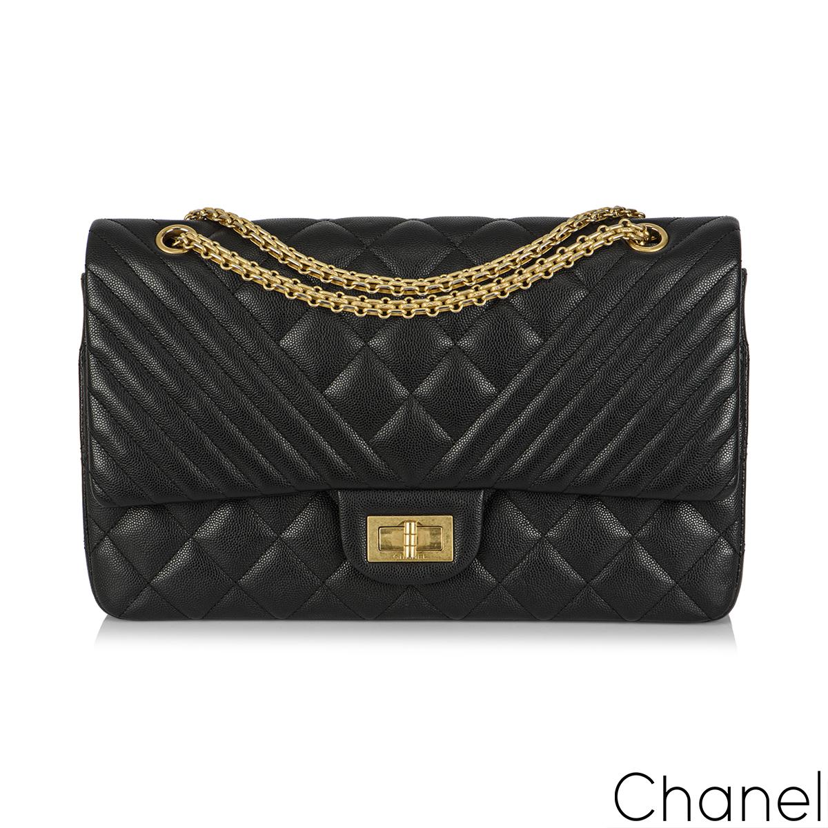 Chanel Black Caviar Jumbo Chevron Quilted 2.55 Reissue Double Flap Bag In Excellent Condition In Mayfair, London, London
