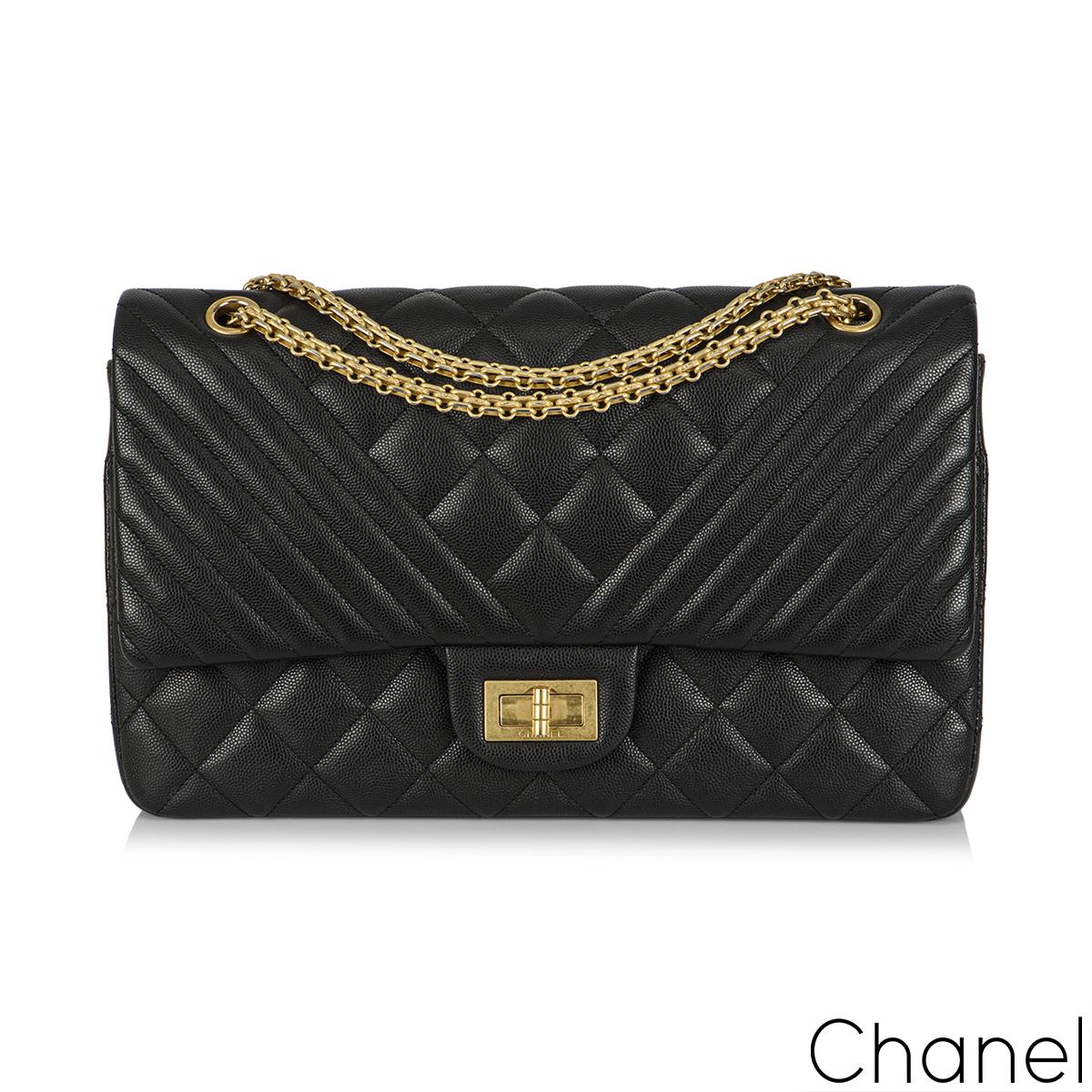 Chanel Black Caviar Jumbo Chevron Quilted 2.55 Reissue Double Flap Bag In Excellent Condition In London, GB