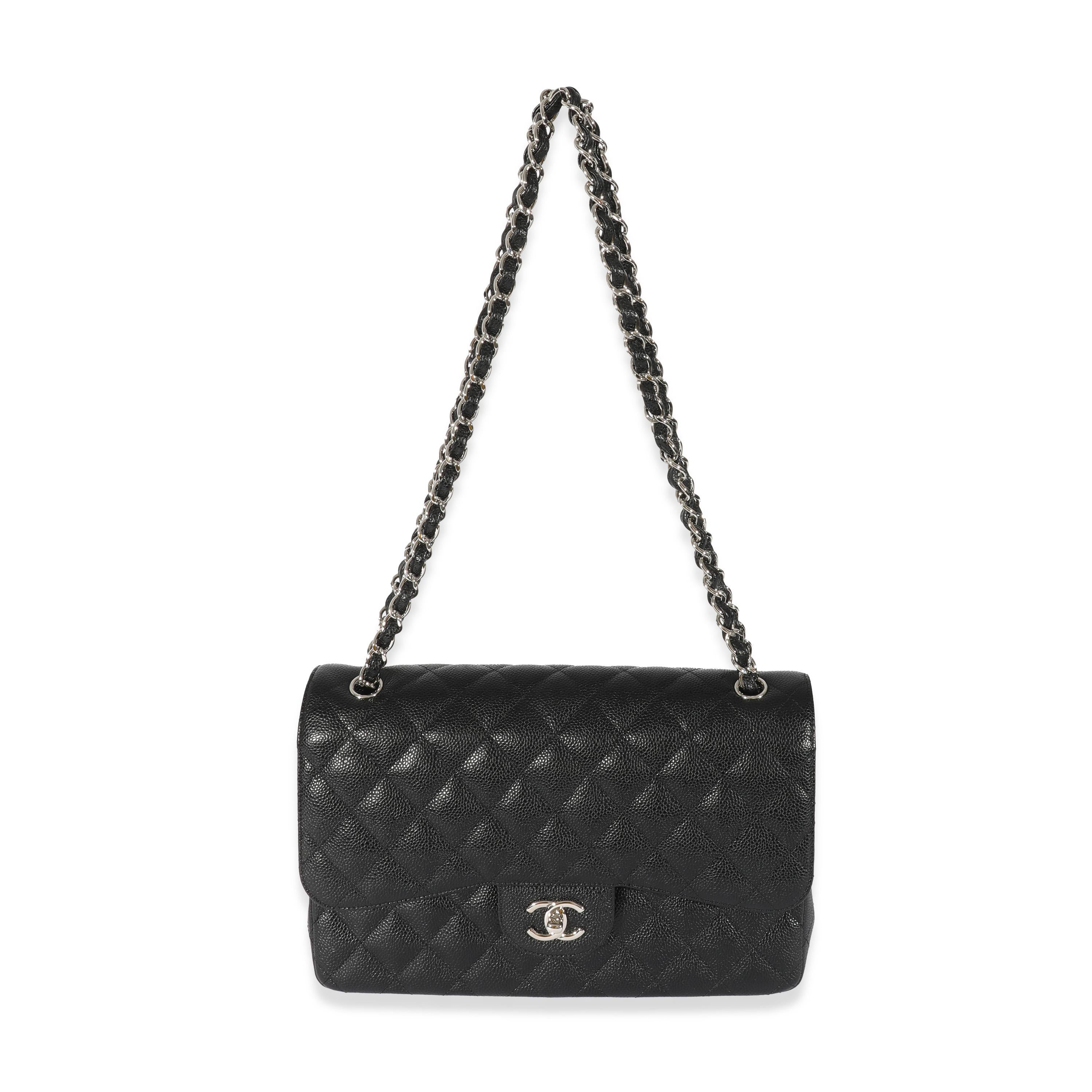Listing Title: Chanel Black Caviar Jumbo Classic Double Flap Bag
 SKU: 128682
 Condition: Pre-owned 
 Condition Description: A timeless classic that never goes out of style, the flap bag from Chanel dates back to 1955 and has seen a number of