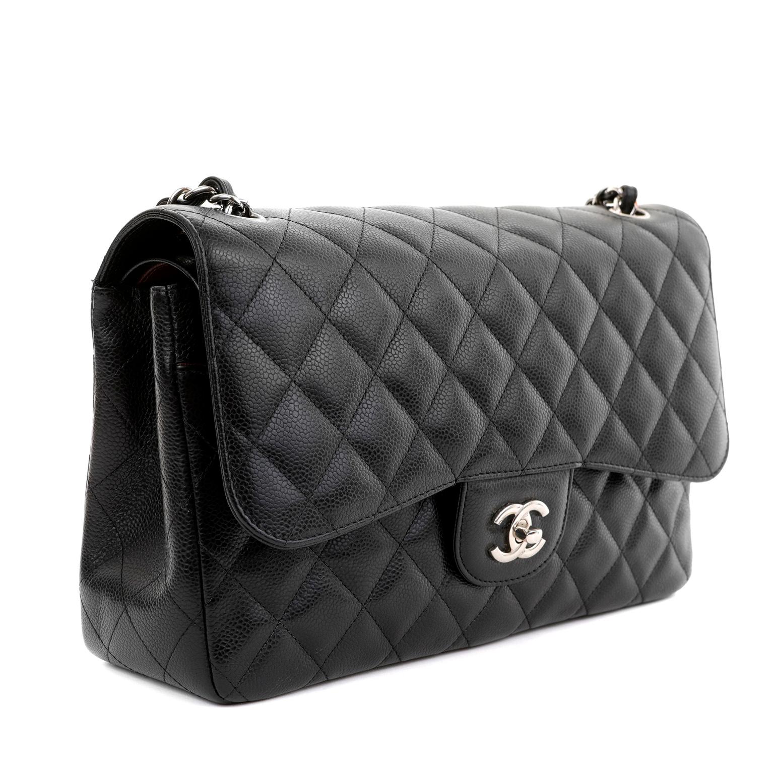 Chanel Black Caviar Jumbo Classic Flap Bag with Silver Hardware In Excellent Condition For Sale In Palm Beach, FL