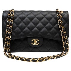 Chanel Schwarze Kaviar Jumbo Classic Flap mit goldener Hardware