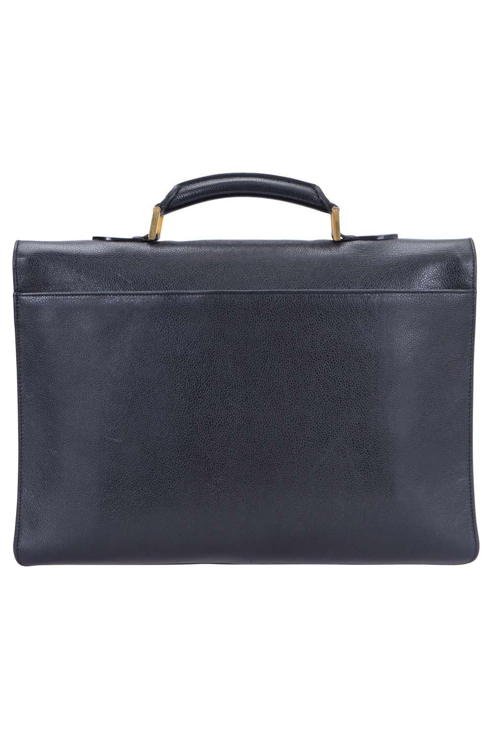 This Chanel briefcase has been designed to keep your office documents and laptop safe. Beautifully crafted from Caviar leather in black and designed with a gold-tone lock at the front flap, this bag is smart and sophisticated. It boasts of a