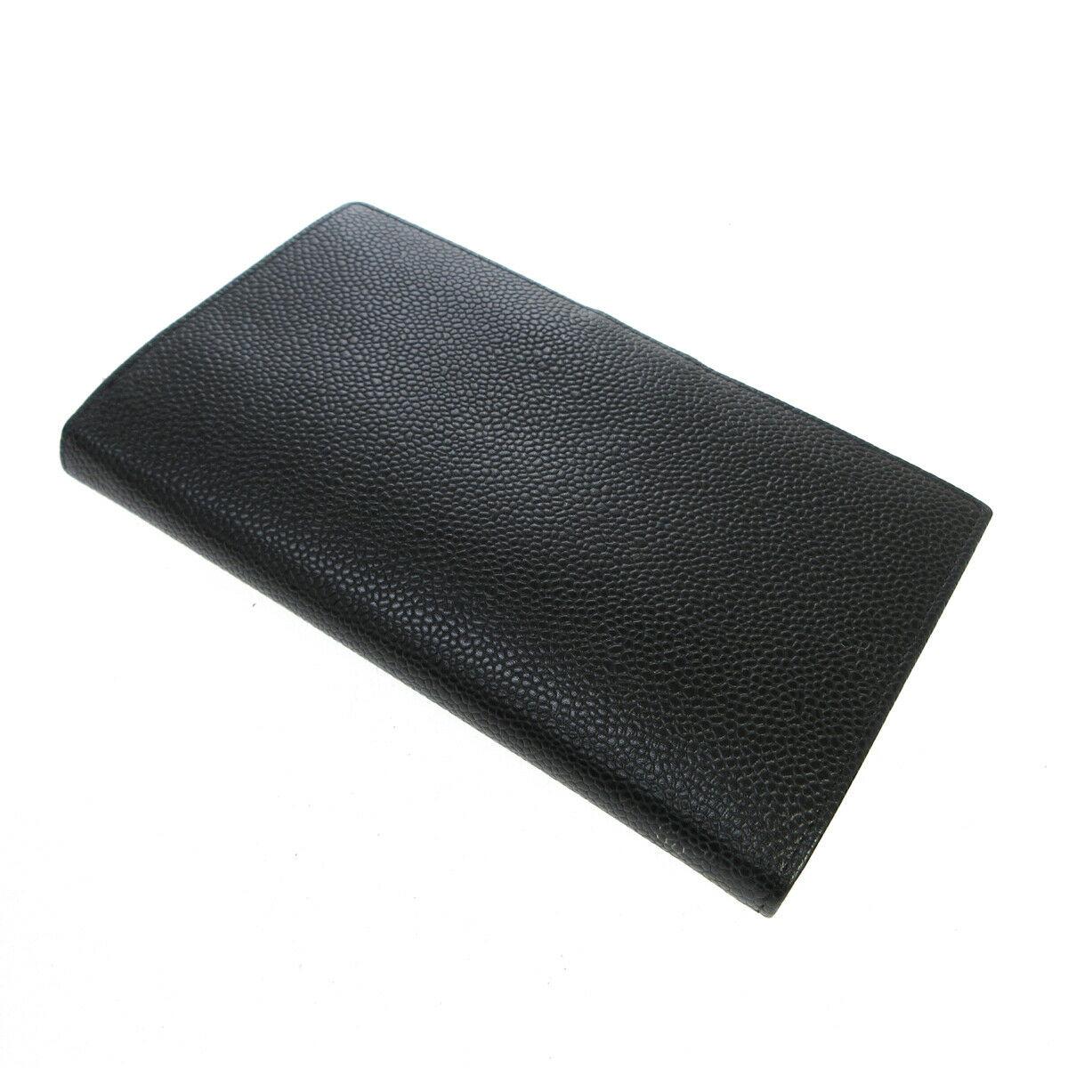 Chanel Black Caviar Leather CC Evening Envelope Clutch Wallet in Box

Caviar leather
Snap closure
Leather and woven lining
Date code present
Made in France
Measures 6.5