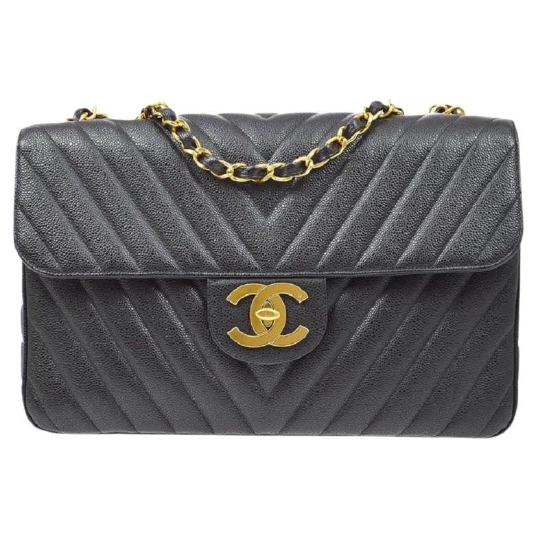 CHANEL Black Caviar Leather Chevron Gold Hardware Shoulder Maxi Flap Bag For Sale