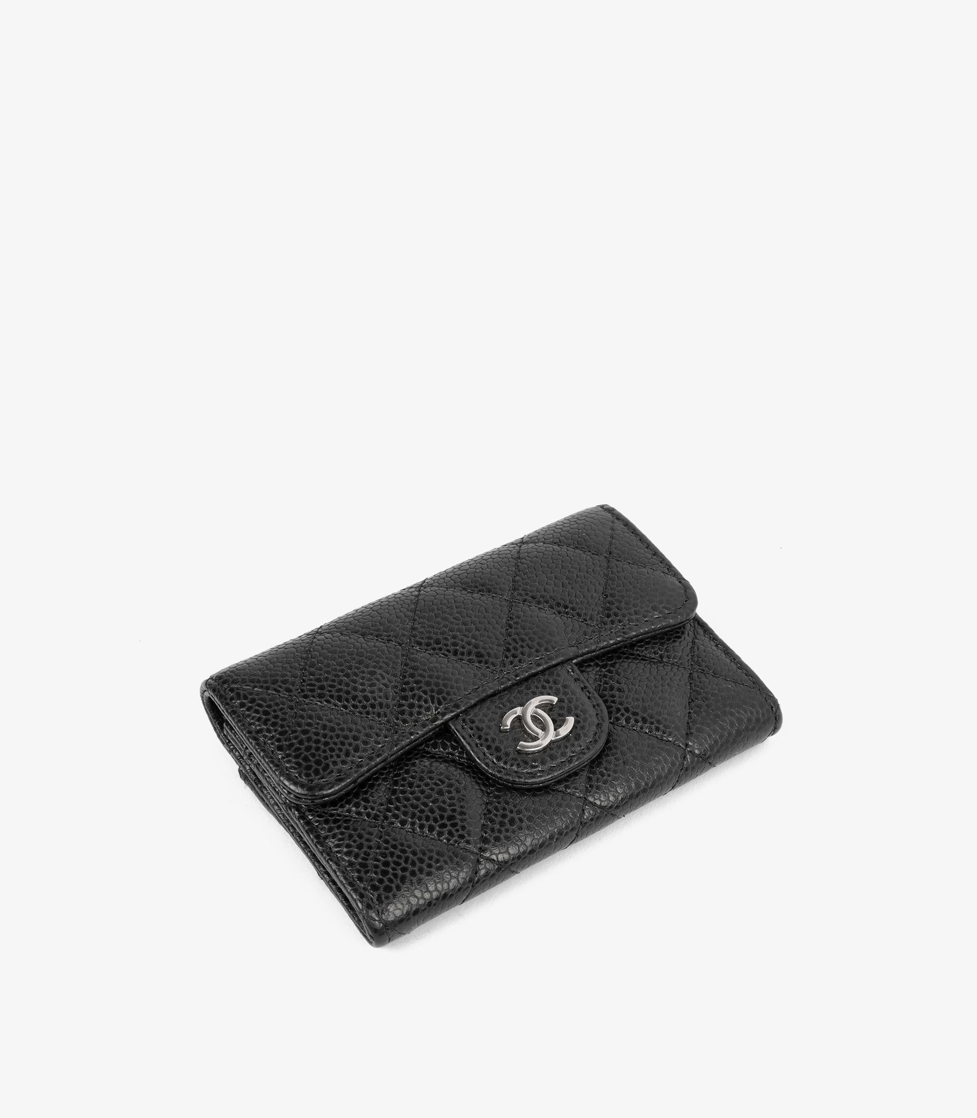 Chanel Black Caviar Leather Classic Flap Wallet

Product Details
Xupes Ref: AA0321
Brand: Chanel
Model: Classic Wallet
Type: Wallet
Serial Number: 29486894
Age: 2019
Colour: Black 
Hardware: Silver
Material(s): Caviar Leather

Specification
Height: