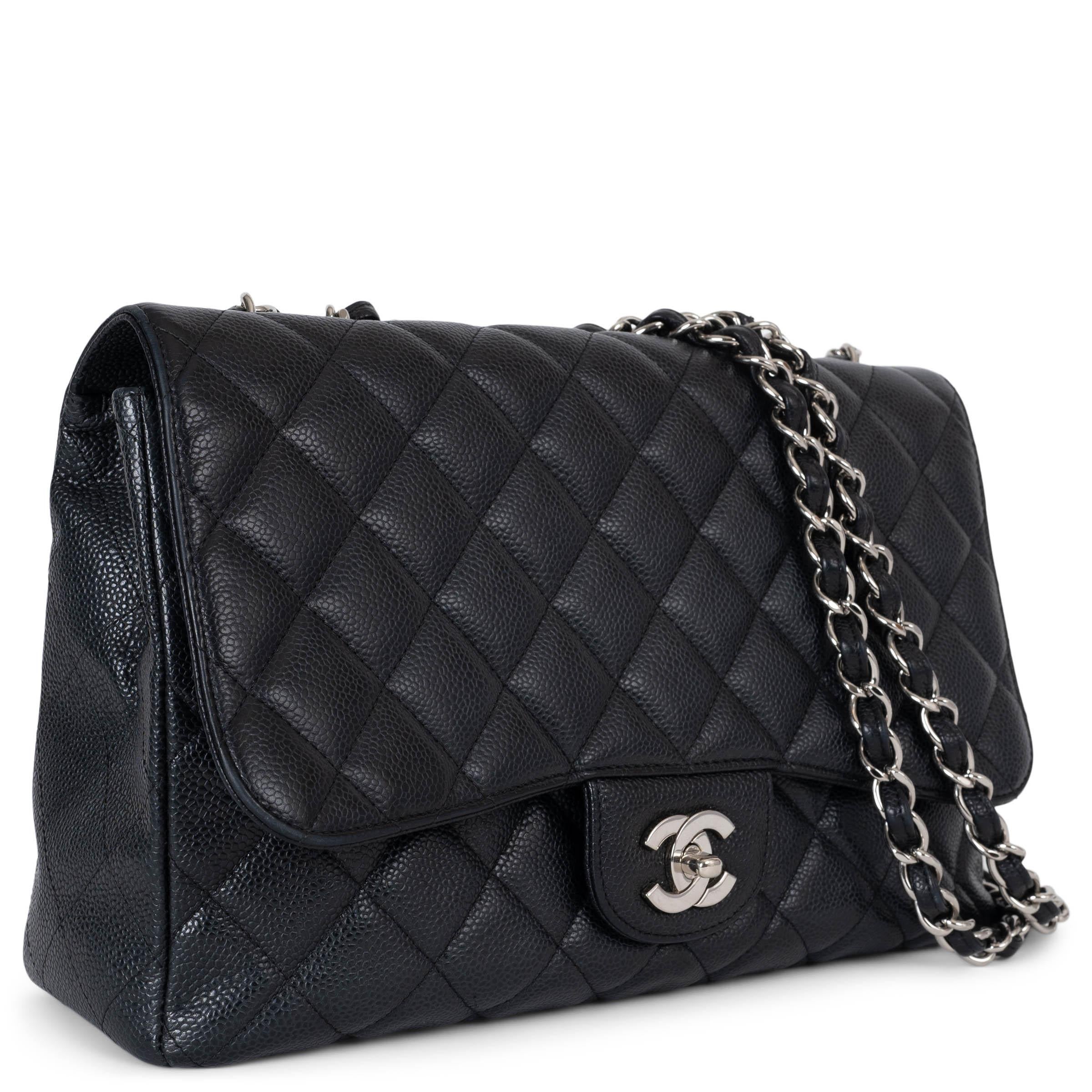 This 100% authentic Chanel classic jumbo single flap bag is crafted from luxurious black caviar leather, known for its durability and elegant texture. Featuring the iconic diamond quilting, it is accented with Chanel’s signature CC turn-lock closure