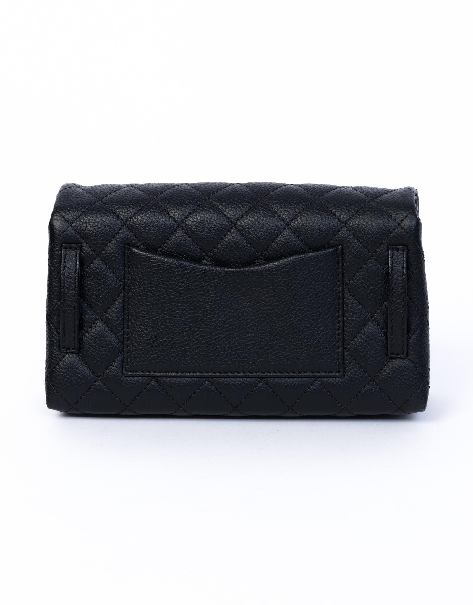 The Chanel Employee Reissue Belt Bag features a black caviar leather exterior in a quilted diamond pattern, a squared silver turn closure, an open interior, and a rear half moon slip pocket. Chanel bags with the serial number 20XXXXXX are