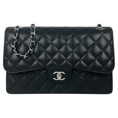Chanel Black Caviar Leather Quilted Classic Double Flap Jumbo Bag.