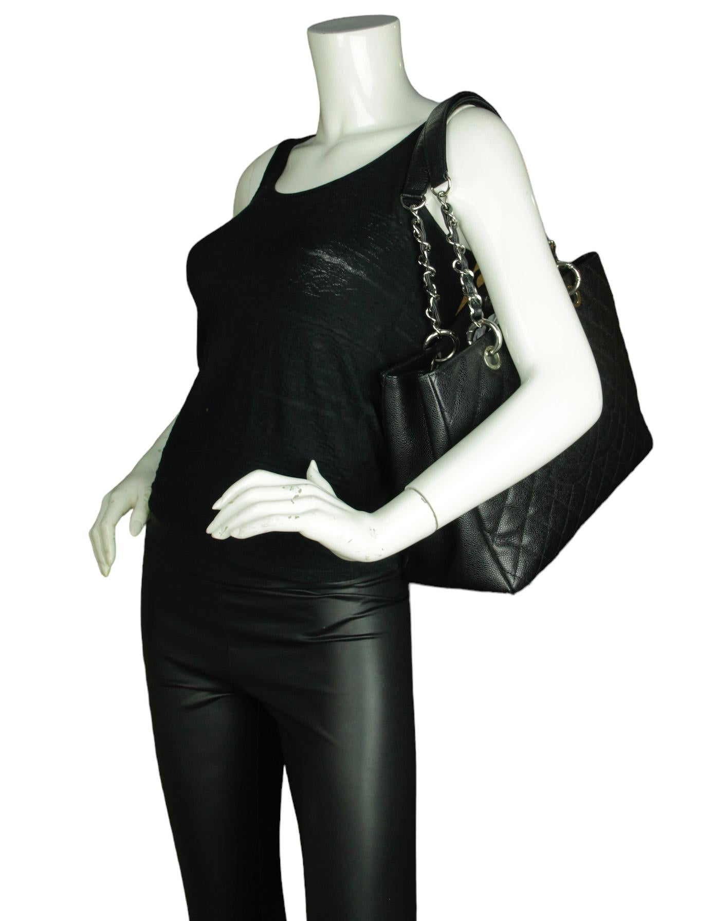 Chanel Black Caviar Leather Quilted Grand Shopper Tote Bag GST with Silver Hardware

Made In: Italy
Year of Production: 2012-2013
Color: Black
Hardware: Silvertone
Materials: Caviar leather
Lining: Black satin textile
Closure/Opening: Open