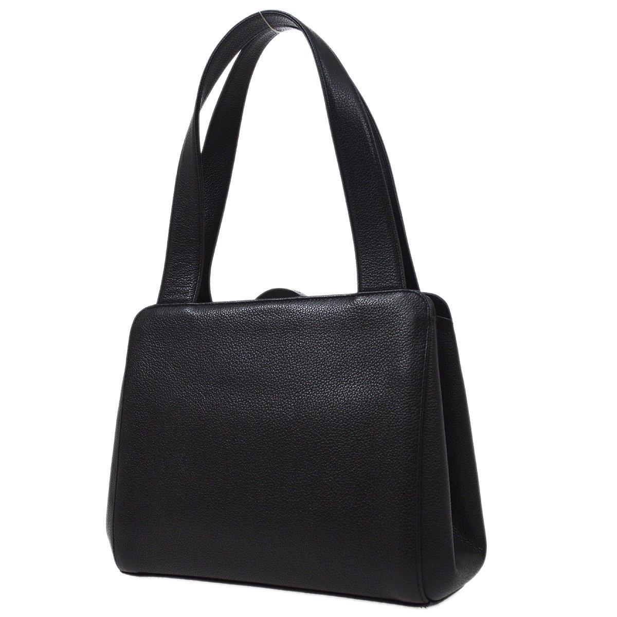 Pre-Owned Vintage Condition
From 1999 Collection
Caviar Leather
Leather Lining
Measures 8