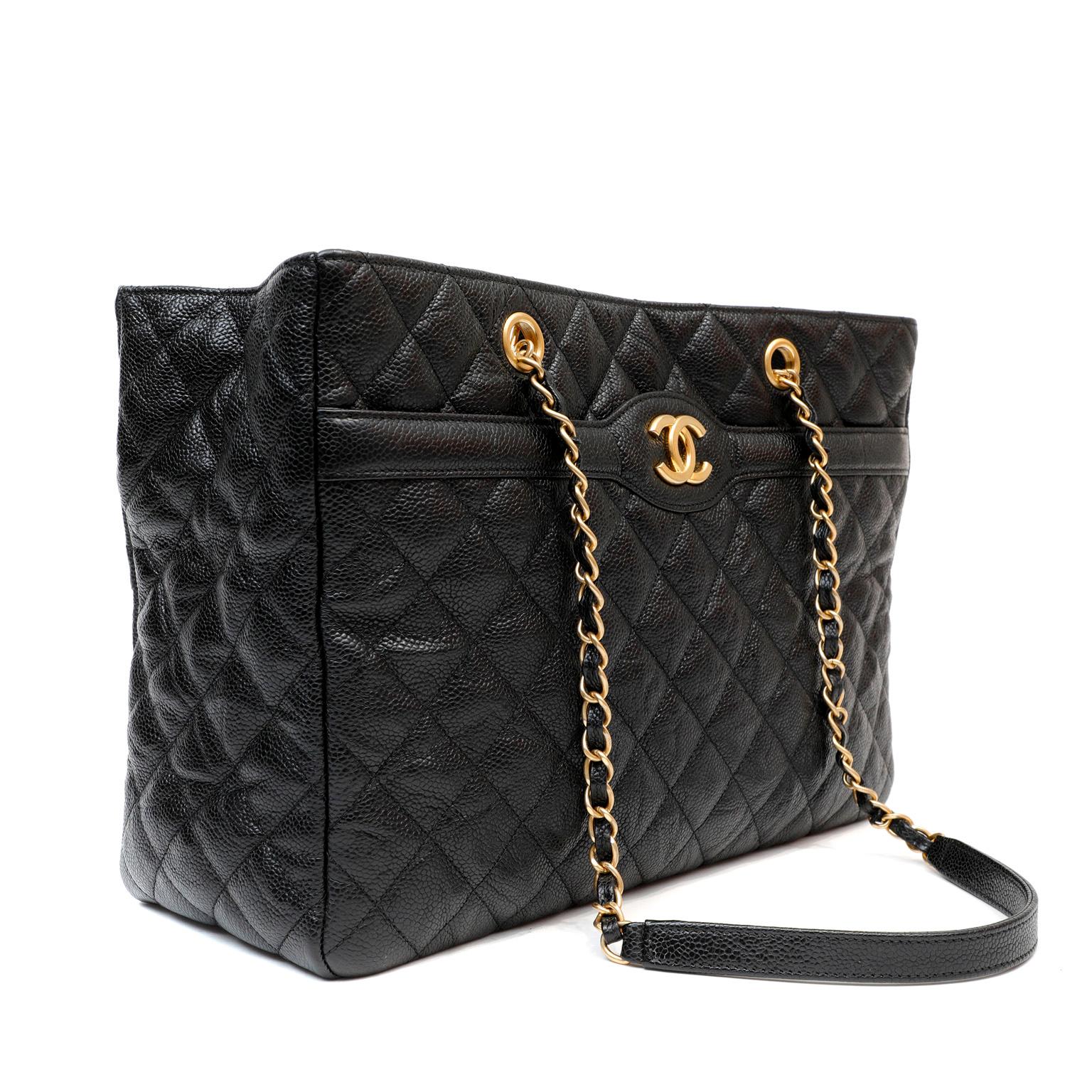 This authentic Chanel Black Caviar Leather Tote is in excellent condition.  Classic Chanel design in durable textured black Caviar leather.  Quilted in signature Chanel diamond pattern with matte gold hardware accents.  Leather and chain entwined