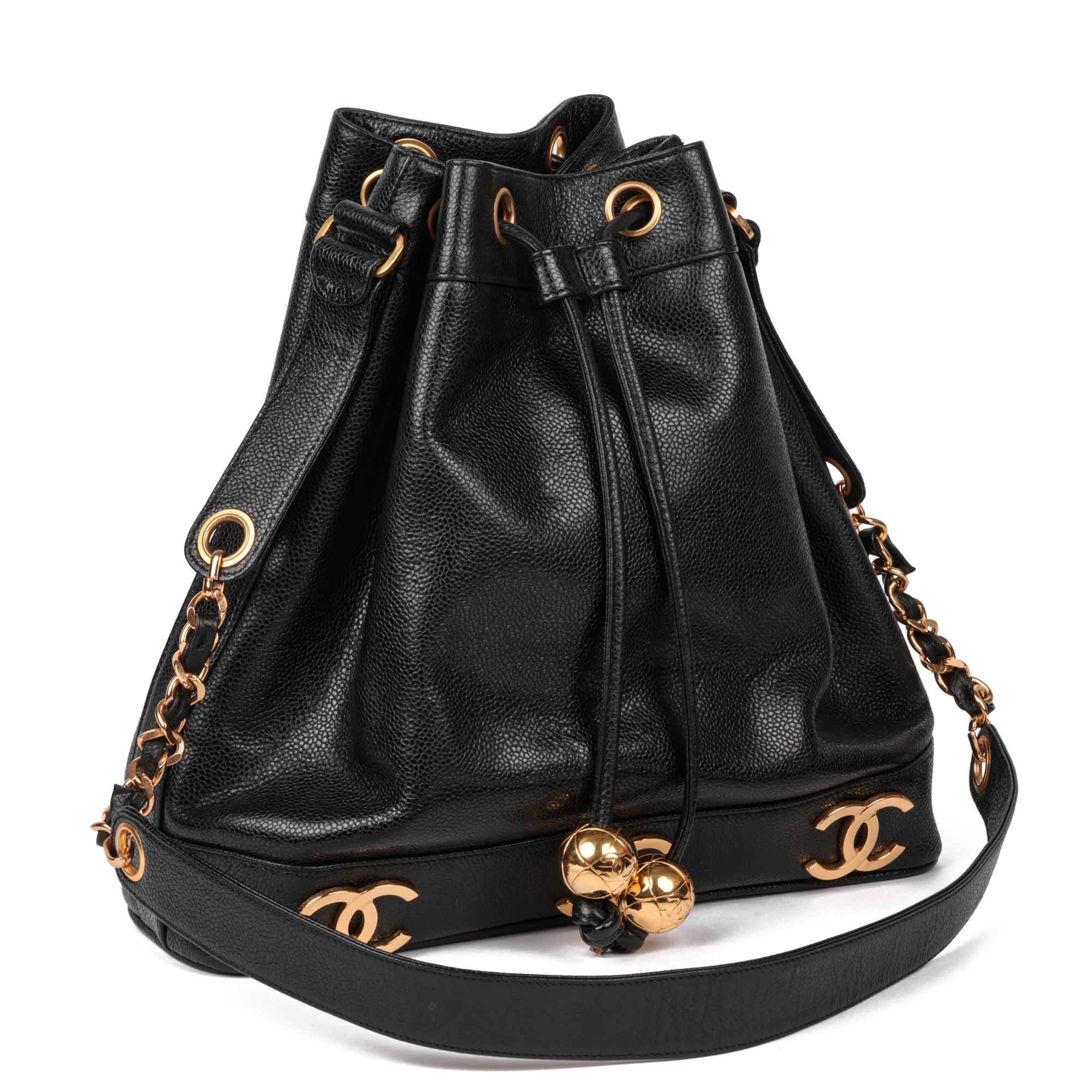 CHANEL
Black Caviar Leather Vintage Classic Logo Trim Bucket Bag with Pouch

Xupes Reference: HB5218
Serial Number: 3621255
Age (Circa): 1994
Accompanied By: Chanel Dust Bag, Care Booklet
Authenticity Details: Serial Sticker (Made in Italy)
Gender: