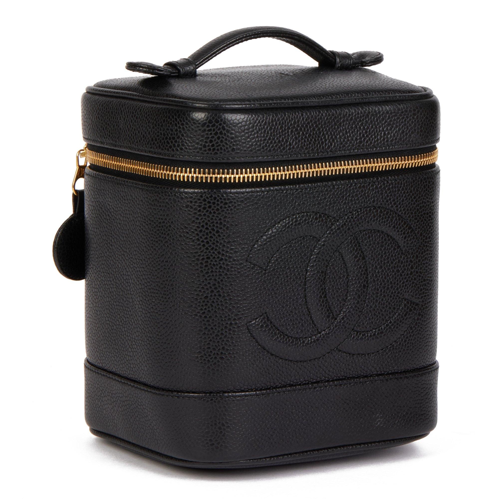 Chanel BLACK CAVIAR LEATHER VINTAGE TIMELESS VANITY CASE

CONDITION NOTES
The exterior is in excellent condition with minimal signs of use.
The interior is in excellent condition with minimal signs of use.
The hardware is in excellent condition with