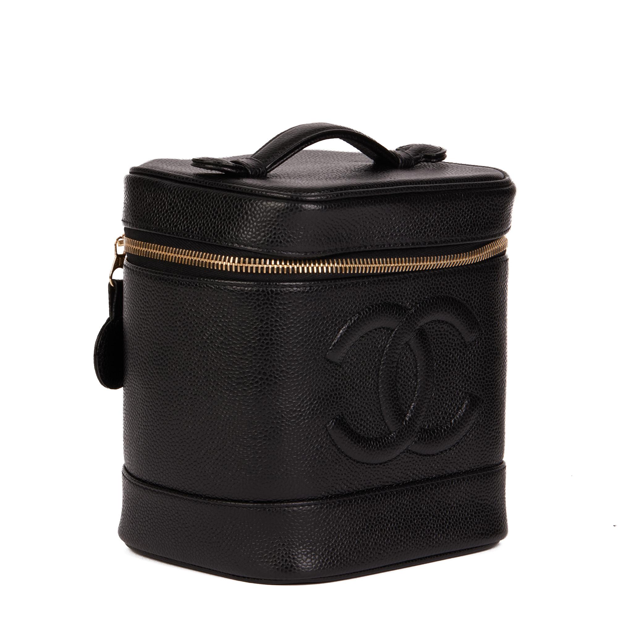 Chanel BLACK CAVIAR LEATHER VINTAGE TIMELESS VANITY CASE

CONDITION NOTES
The exterior is in excellent condition with minimal signs of use.
The interior is in excellent condition with minimal signs of use.
The hardware is in excellent condition with