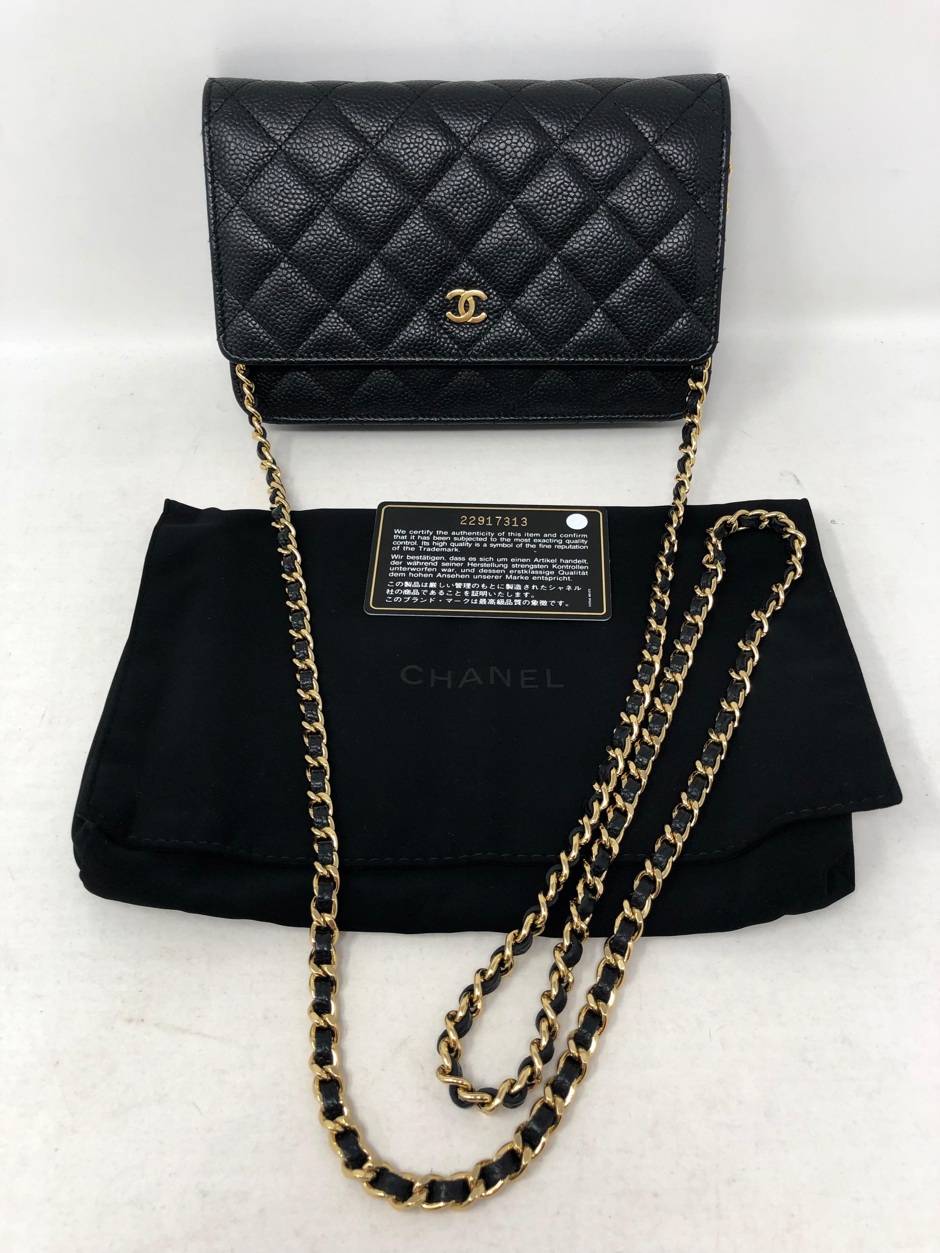 Chanel Black Caviar Leather Wallet On A Chain. Gold hardware. New condition. Never used. Classic style and most wanted. Crossbody or clutch. Gold hardware is mint. Includes dust cover, authenticity card, and box. Guaranteed authentic. 