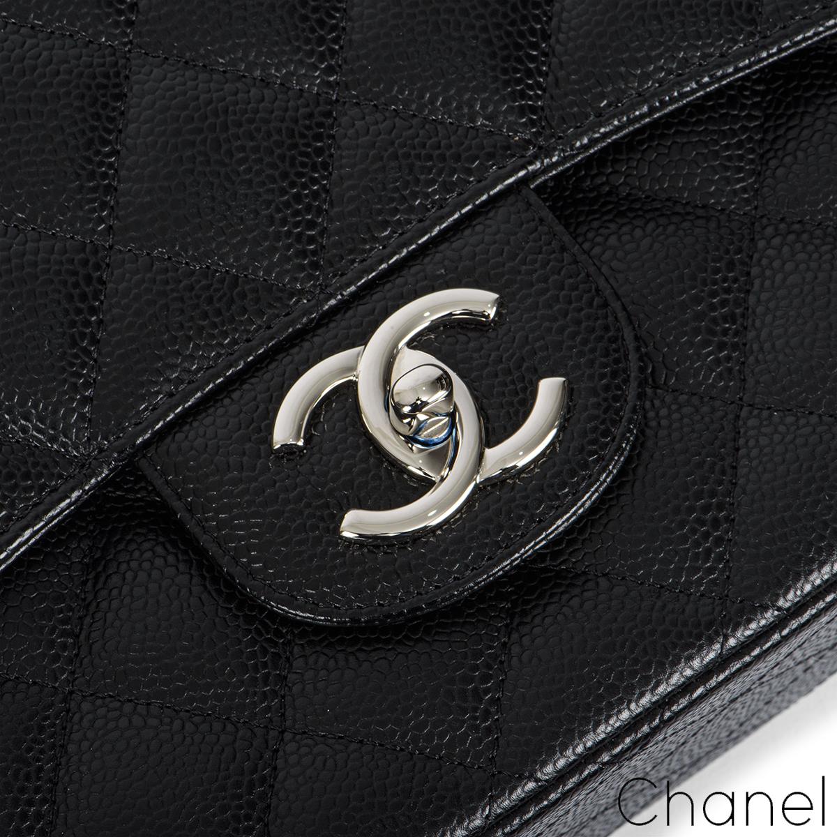 Chanel Black Caviar Maxi Classic Double Flap Bag In Excellent Condition In London, GB