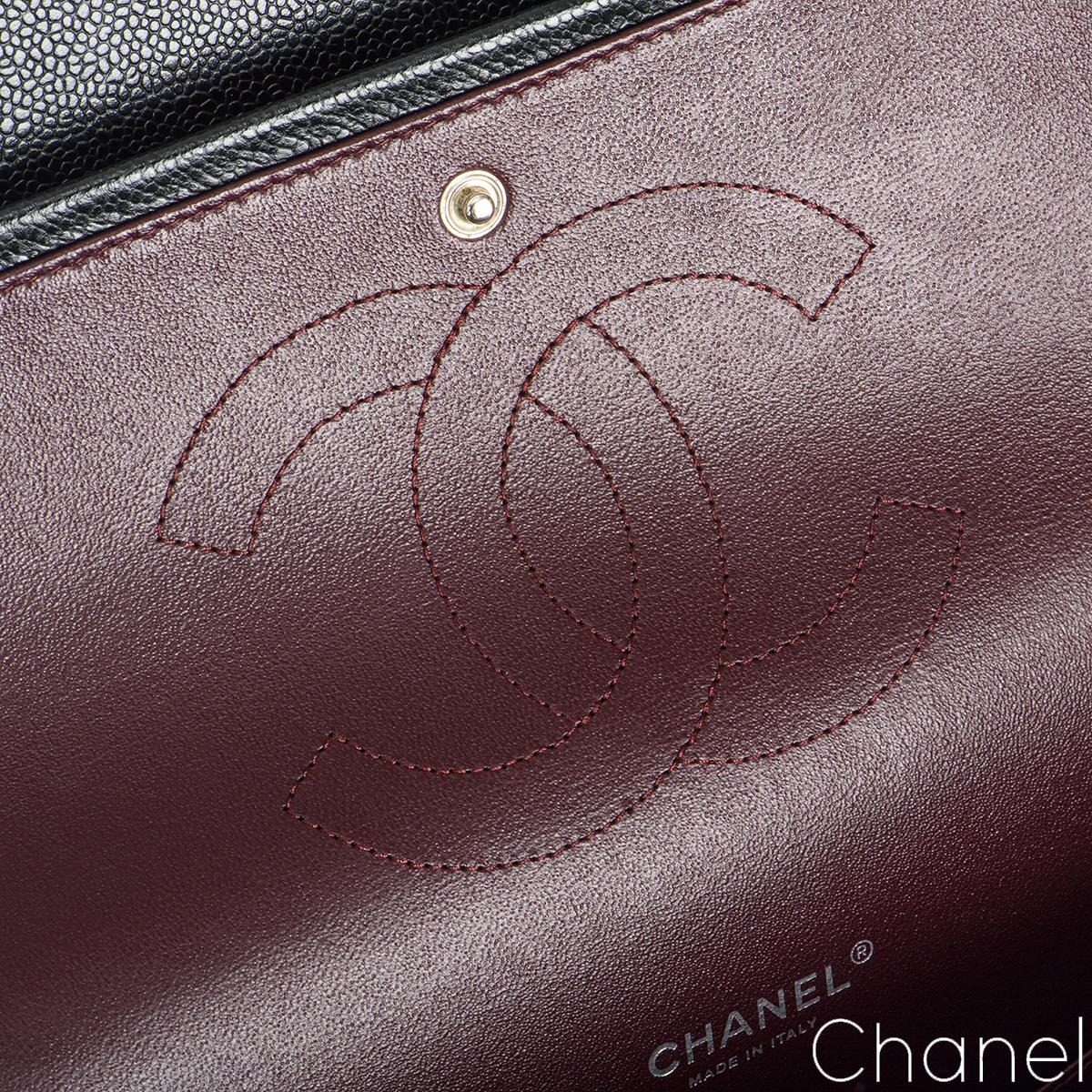Women's Chanel Black Caviar Maxi Classic Double Flap Bag