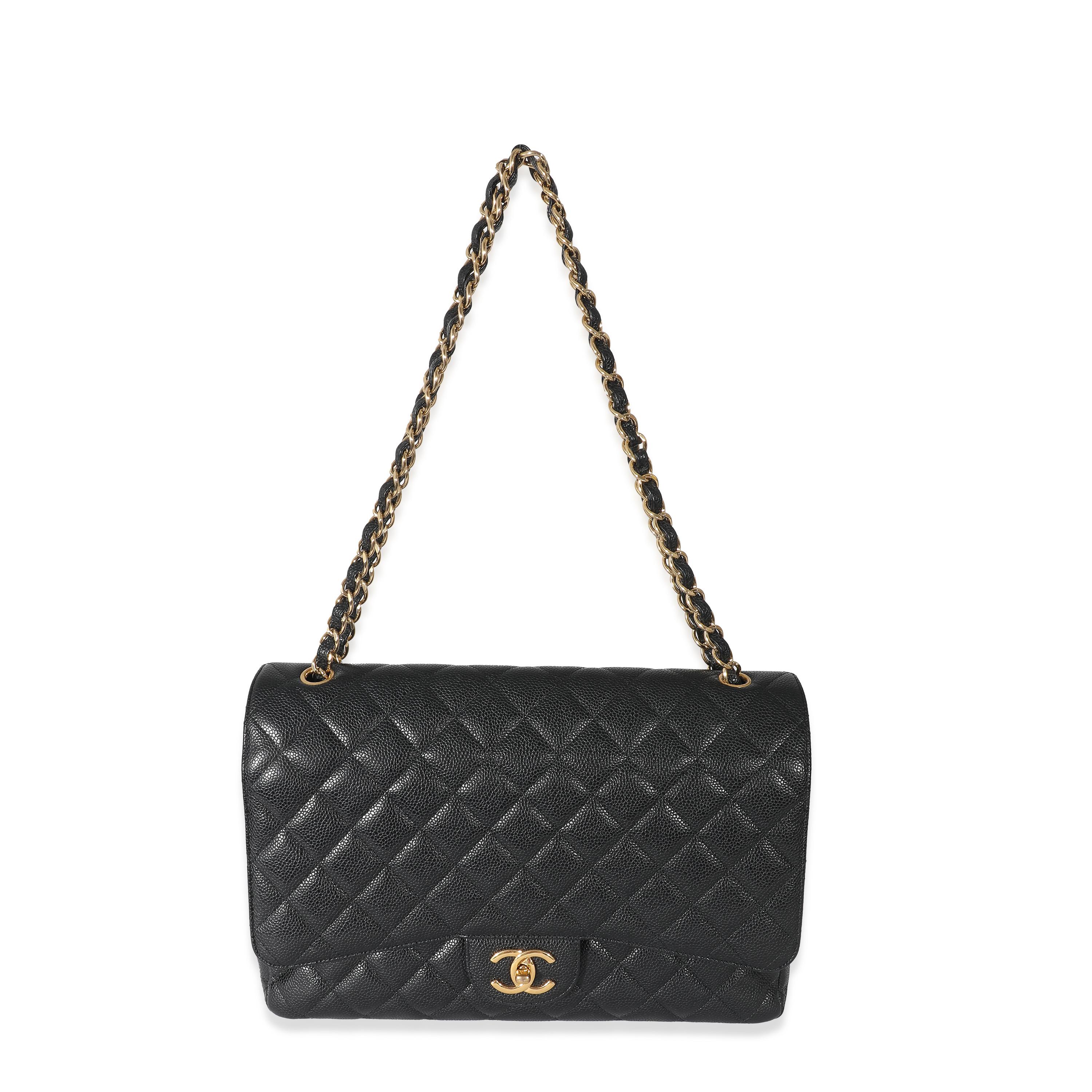 Listing Title: Chanel Black Caviar Maxi Double Flap Bag
SKU: 133186
Condition: Pre-owned 
Handbag Condition: Very Good
Condition Comments: Item is in very good condition with minor signs of wear. Exterior corner scuffing. Scratching to hardware.