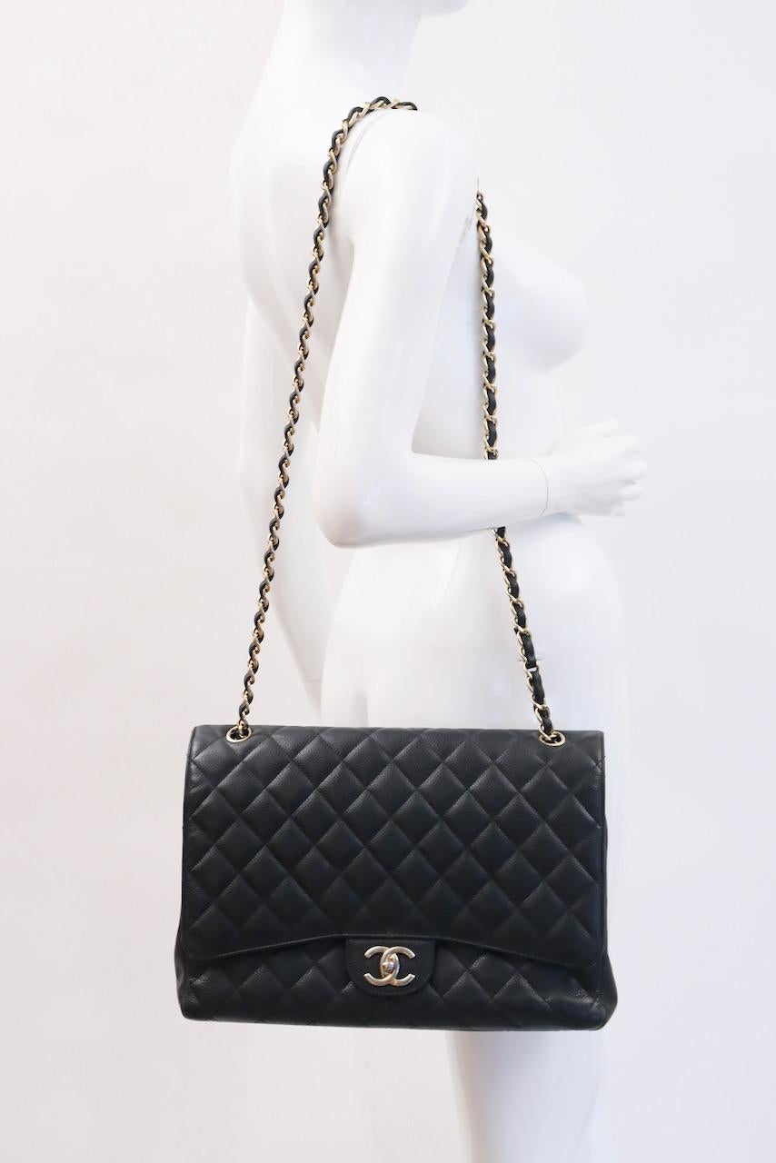 The Ultimate CHANEL Caviar Maxi Double Flap Bag.  This classic black caviar double flap is leather lined and features gold hardware!  This is a forever bag.

 

Designer: Chanel

Condition: Good/Very Good.  This bag can be easily worn as is or a