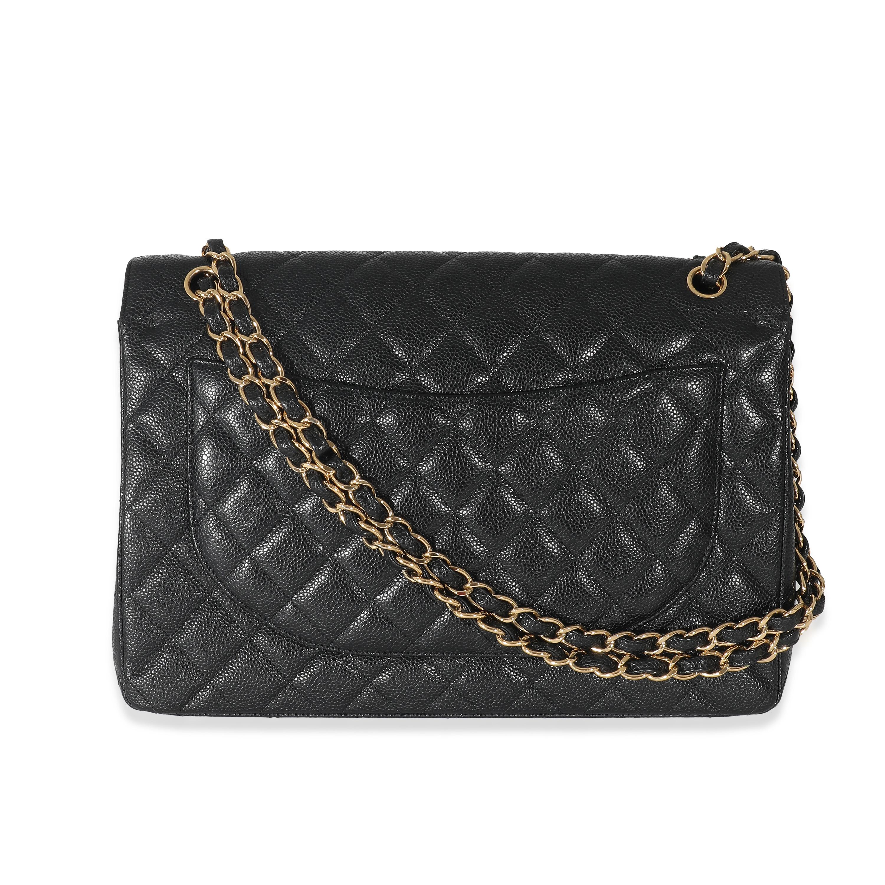 Chanel Black Caviar Maxi Double Flap Bag In Excellent Condition For Sale In New York, NY