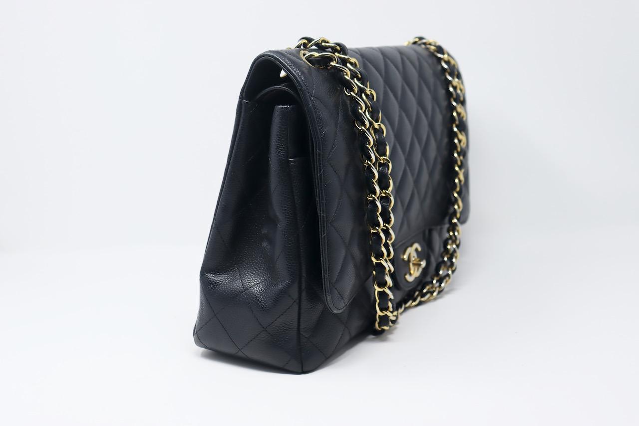 CHANEL Black Caviar Maxi Double Flap Bag In Good Condition For Sale In Georgetown, ME